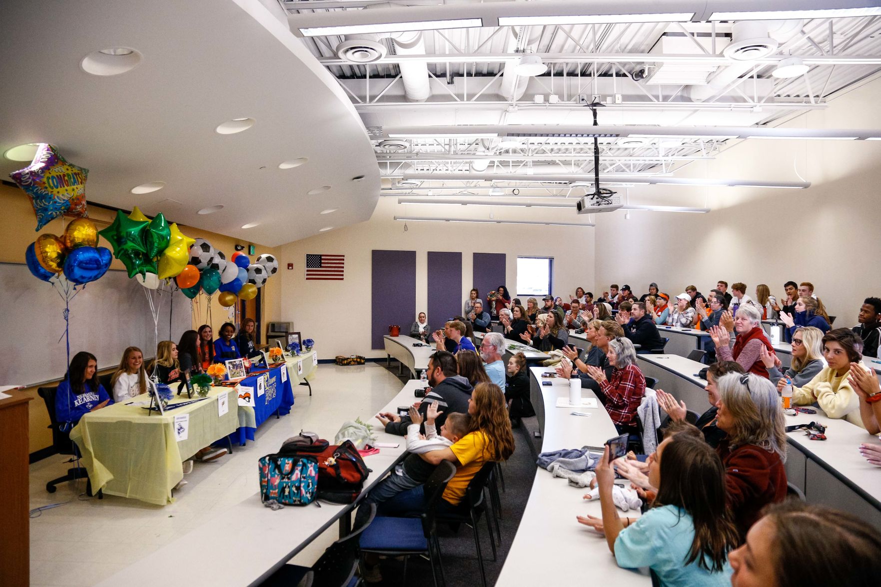 SIGNING DAY: Rampart athletes sign their National Letter of Intent